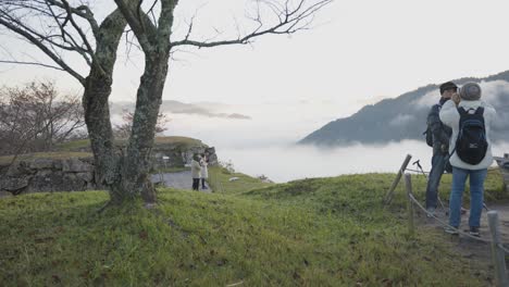 Slow-motion-shot-as-photographers-wait-to-capture-sunrise-on-foggy-morning