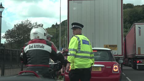 Well-known-youtube-active-patriot-is-moved-off-by-the-police-during-a-demonstration-in-Dover,-Kent,-05-09-20