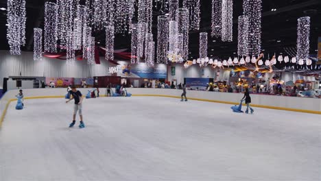 People-Having-Fun-In-The-Ice-Skating-Rink---timelapse