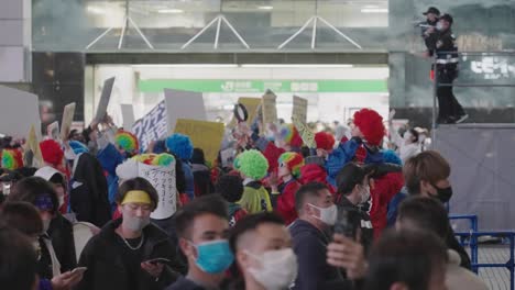 Group-Of-People-Demonstrate-Protest-Against-Wearing-Masks-At-The-Shibuya-Station-On-Halloween-Night-Amidst-The-Pandemic-Coronavirus-In-Tokyo,-Japan