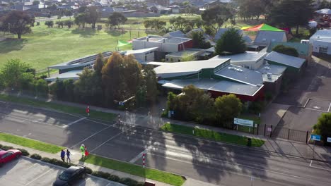 AERIAL,-Crossing-Supervisor-Packing-Up-At-The-End-Of-A-School-Day