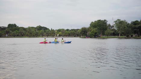 A-group-of-young-men-enjoying-a-day-on-a-lake-in-Thailand-kayaking