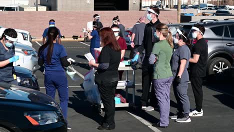 Medical-staff-and-student-working-at-Covid-19-vaccine-point-of-distribution