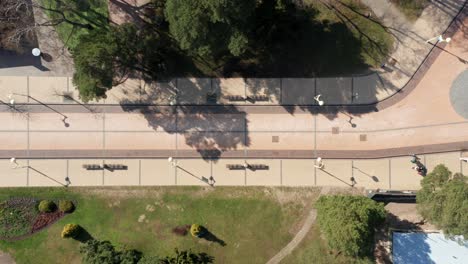 AERIAL:-Basanaviciaus-Central-Pedestrian-Street-of-Palanga-with-People-Walking-in-Early-Spring-Time