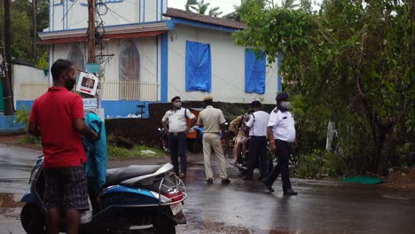 Group-Indian-Police-Officers-Stop-Motorcycle-During-Traffic-Stop-on-Busy-Road