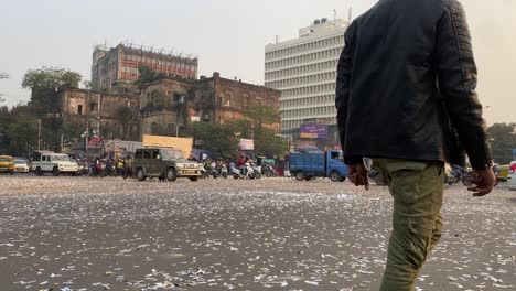 Celebration-at-Kolkata-thanking-UNESCO-for-'Intangible-Cultural-Heritage'-tag-to-Durga-Puja-through-massive-rally,-with-vehicles-moving-on-the-road