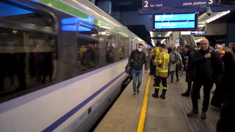 2022-Russian-invasion-of-Ukraine---Central-Railway-Station-in-Warsaw-during-the-refugee-crisis---train-to-Vienna-arriving-the-platform