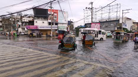 Traffic-view-of-overflow-streets-and-intersection-highway-due-tropical-storm-in-Dagupan-City,-Philippines