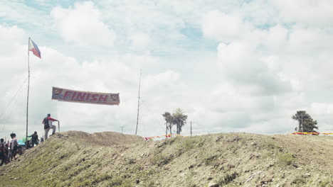 Participants-fly-through-the-finish-line-of-the-highly-anticipated-motocross-competition