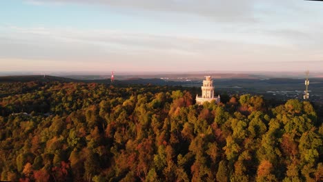 Aerial-orbit-of-viewpoint,-lookout-point-of-Janos-Hill,-sunrise