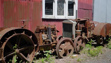 Historic-antique-tractors-out-the-front-of-an-old-shed