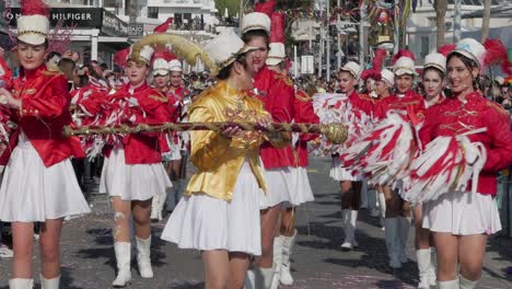 A-group-of-costumed-woman-march-towards-camera-in-the-parade-at-the-Paphos-Carnival