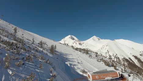 Areal-view-on-end-of-a-ski-lift-at-the-top-of-a-ski-slope