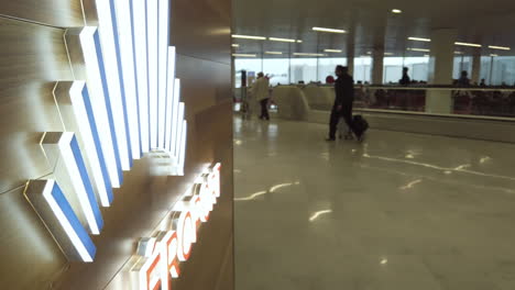 Different-views-of-the-Paris-Airport-logo-inside-an-Orly-boarding-terminal