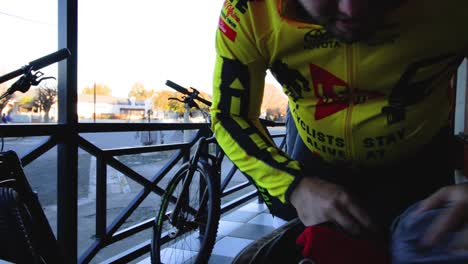 Cyclist-getting-ready-to-ride-a-bike