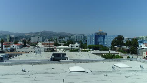 4k-Drone-aerial-pan-up-shot-of-a-building-to-the-Church-of-Scientology-building-and-campus-on-Sunset-Blvd-in-Los-Angeles-California