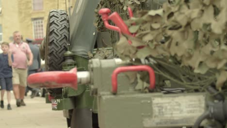 Army-vehicle-in-camouflage-in-high-street