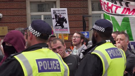 Antifa-gather-outside-the-BBC-studio-to-protest-Tommy-Robinson-in-London,-UK