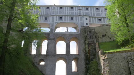 Tourists-walking-near-medieval-European-architectural-attraction