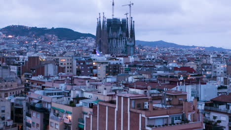 Cityscape-of-Sagrada-Familia-and-the-city-at-sunrise,-Spain