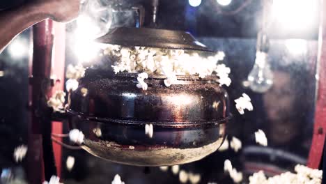 Popcorn-bursting-inside-a-popcorn-kettle-in-slow-motion