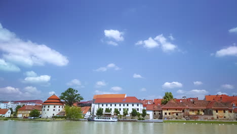 Panoramic-view-of-Maribor's-waterfront-promenade-called-Lent