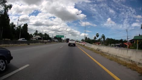 This-is-a-time-lapse-with-an-action-camera-mounted-in-front-of-the-truck,-driving-from-Pranburi-to-Hua-Hin-and-Hua-Hin-to-Bangkok-on-Phet-Kasem-Road