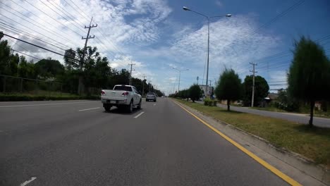 This-is-a-time-lapse-with-an-action-camera-mounted-in-front-of-the-truck,-driving-from-Pranburi-to-Hua-Hin-and-Hua-Hin-to-Bangkok-on-Phet-Kasem-Road