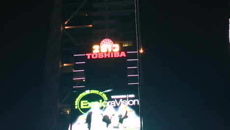 Zoom-out,-Huge-billboard-on-wall-of-modern-building-in-Manhattan-times-square-in-New-York