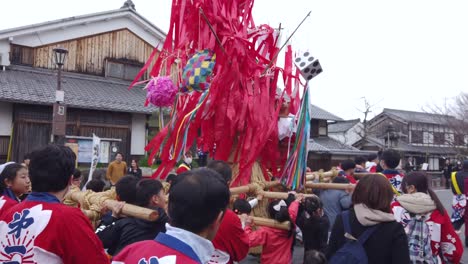 Japanese-children-carrying-Sagicho-float-in-annual-Omihachiman-festival