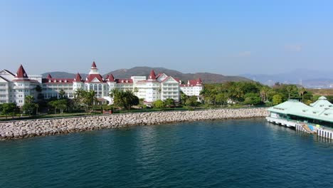 Disneyland-Hotel-and-park-in-Hong-Kong-empty-and-closed-for-visitors-due-to-covid19-lockdown-guidelines,-Aerial-view