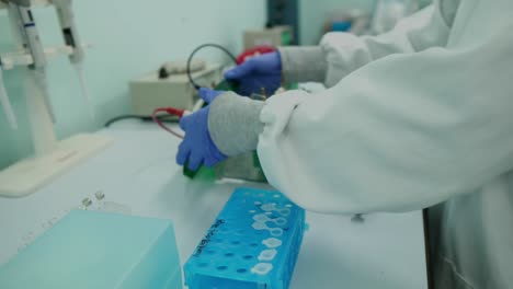 View-Of-Scientist-Using-Equipment-for-Electrolysis-Analysis-In-Lab