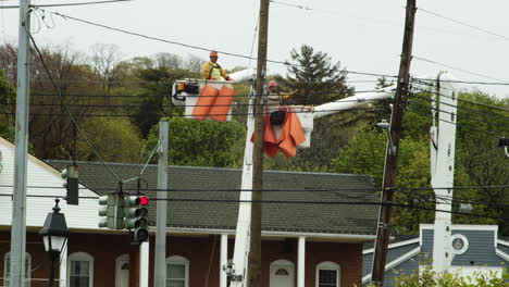 Construction-workers-repairing-power-and-phone-cables-in-California