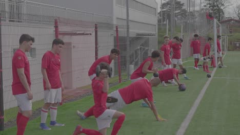 young-boys-training-soccer-with-ball-goal