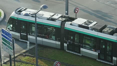 Tracking-view-of-Ile-de-France-Mobilites-metro-with-people-at-Paris-Orly-airport