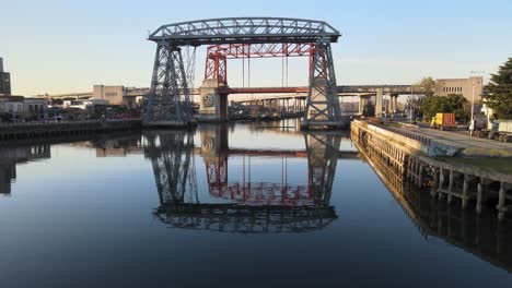 Low-push-in-shot-of-famous-bridges-on-Riachuelo-river-in-Buenos-Aires