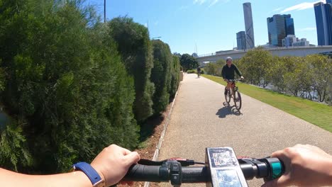 Riding-Electric-kick-scooter,-POV-mode-riding-E-scooter-around-the-Brisbane-City,-2022-Olympic