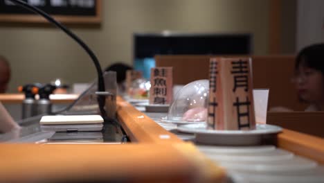 Close-up-to-Sushi-Conveyor-Belt-Train---Authentic-Japanese-Style-Gatten-Sushi-Train-Restaurant-at-Gloria-Outlet-Taoyuan-City-Taiwan