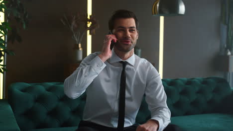 Happy-businessman-talking-on-smartphone.-Professional-calling-on-mobile-phone