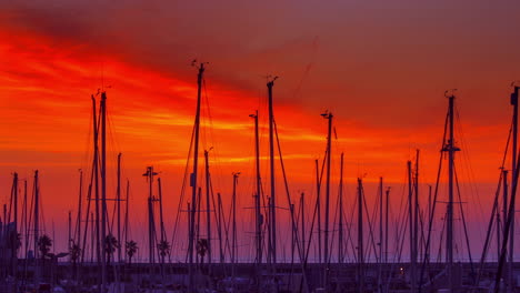 Yacht-port-at-sunrise.-Timelapse-of-yacht-marina.-Red-sky-over-yacht-harbour