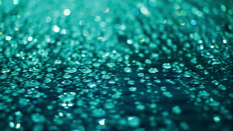 Droplets-on-glass-at-night.-Closeup-of-water-drops-on-glass-after-rain