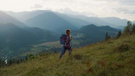 Woman-climb-hike-mountains.-Active-backpacker-walk-nature-green-hill-at-sunrise.
