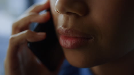 African-business-woman-face-closeup.-Businesswoman-calling-phone