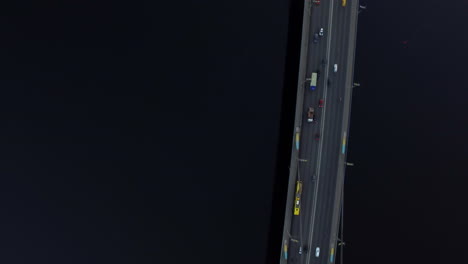 Drone-view-car-driving-on-suspension-bridge.-Car-moving-on-highway-bridge