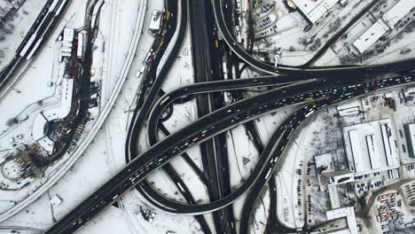 Top-view-car-motion-highway-junction-in-city.-Aerial-view-road-interchange