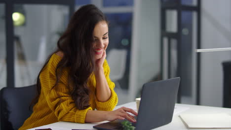 Closeup-smiling-businesswoman-working-laptop-in-office.-Pretty-woman-typing-text