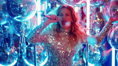 Emotional-girl-jumping-in-karaoke.-Euphoric-woman-singing-on-neon-background