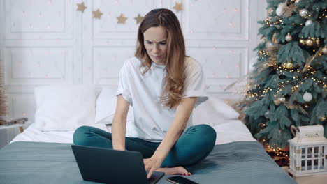 Upset-business-woman-getting-sad-news-on-laptop-computer-in-luxury-house.
