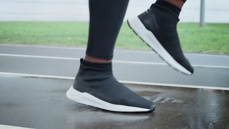 jogger-exercising-at-stadium-track.