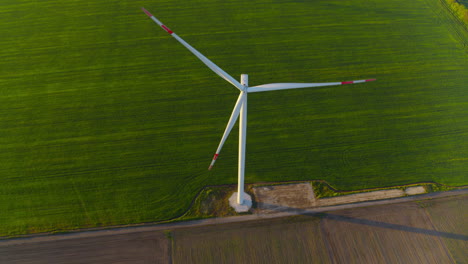 Windmill-farm-generating-green-power.-View-of-windmill-rotating-in-rural-area.